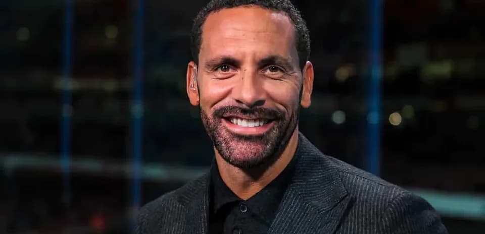 Presenter smiling during sports broadcast segment