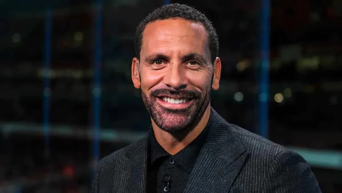 Presenter smiling during sports broadcast segment