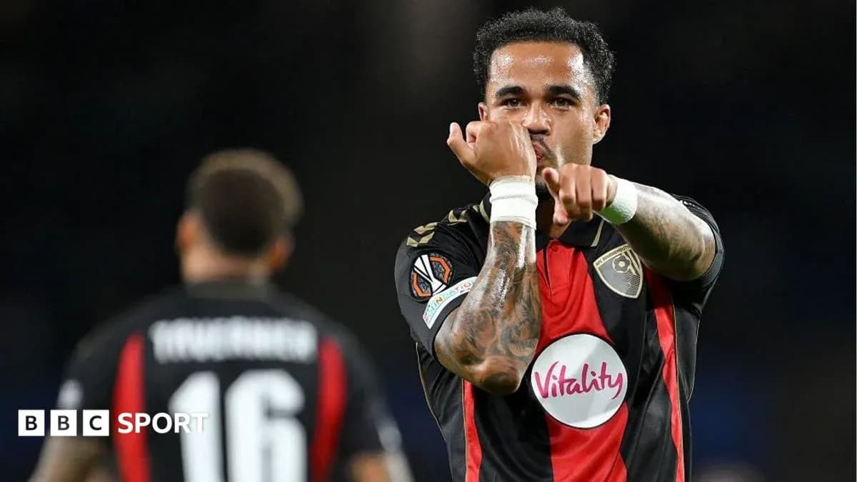 Player celebrating a goal with hand gesture