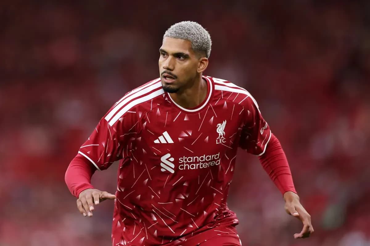 Player in Liverpool kit running on the pitch