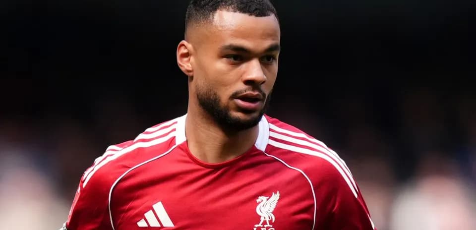 Player wearing Liverpool FC jersey during match