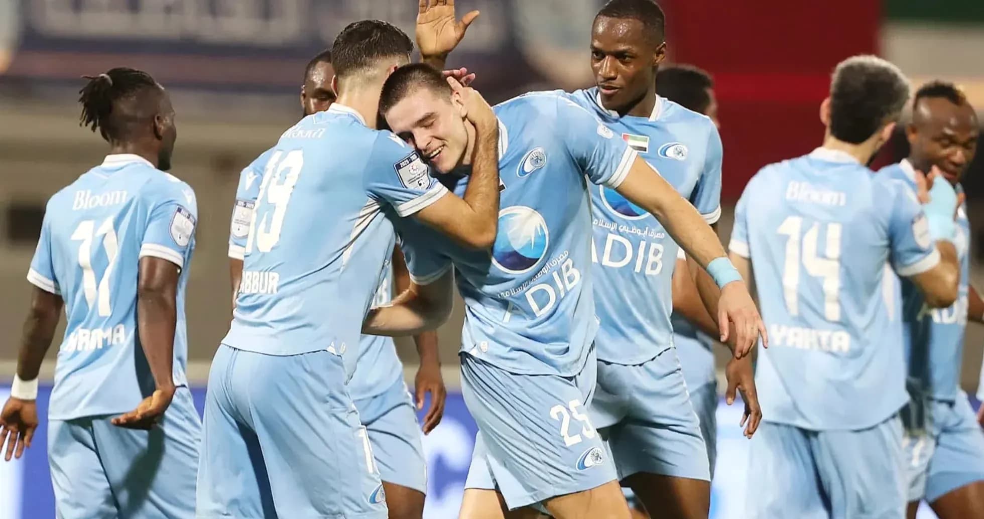 Players celebrating during Al Wahda U23 match