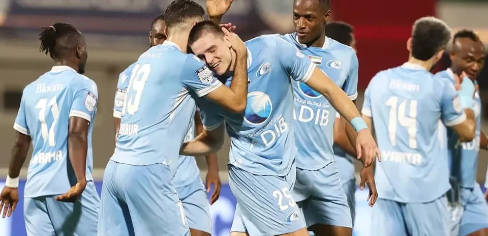 Players celebrating during Al Wahda U23 match