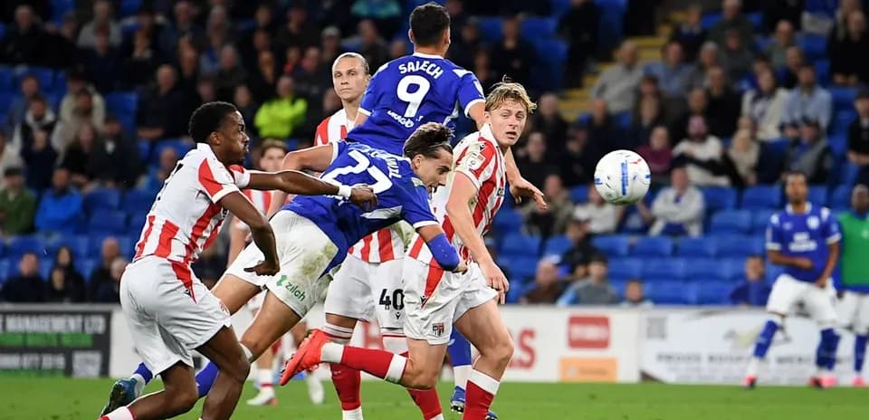 Players contesting a high ball during a match