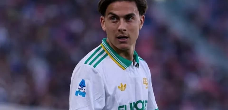 Player wearing white jersey during football match