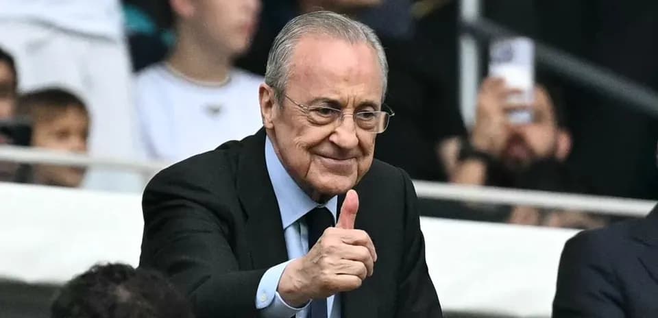 Man giving thumbs up in a sports setting