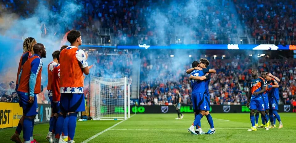 Players celebrating a goal during FC Cincinnati match