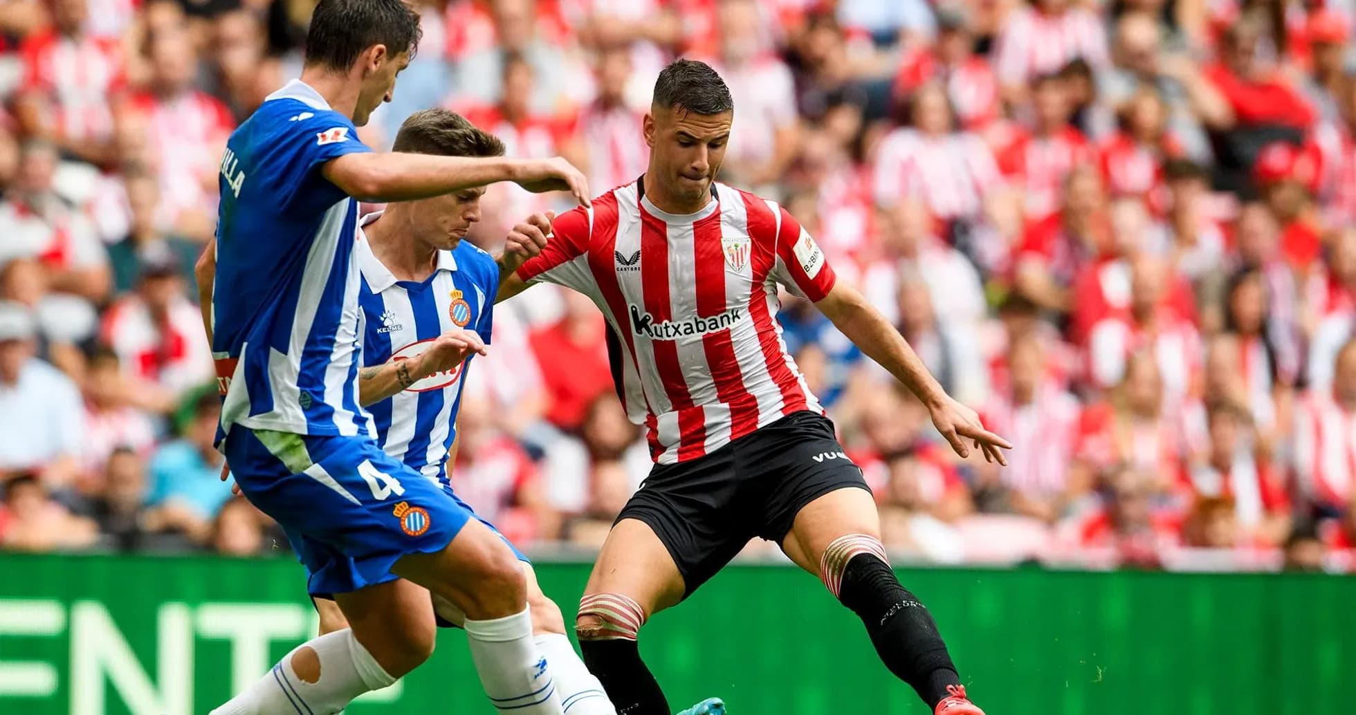 Espanyol and Athletic Club players battling for the ball