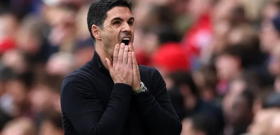 Manager reacting during a football match on the sidelines