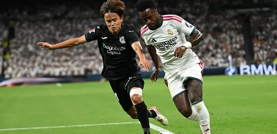 Two players contesting the ball during a match