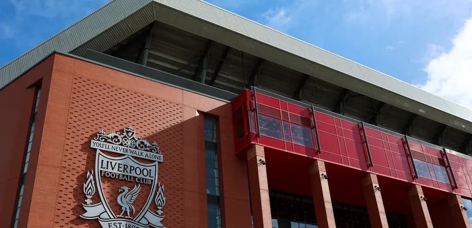 Liverpool Football Club sign on stadium exterior