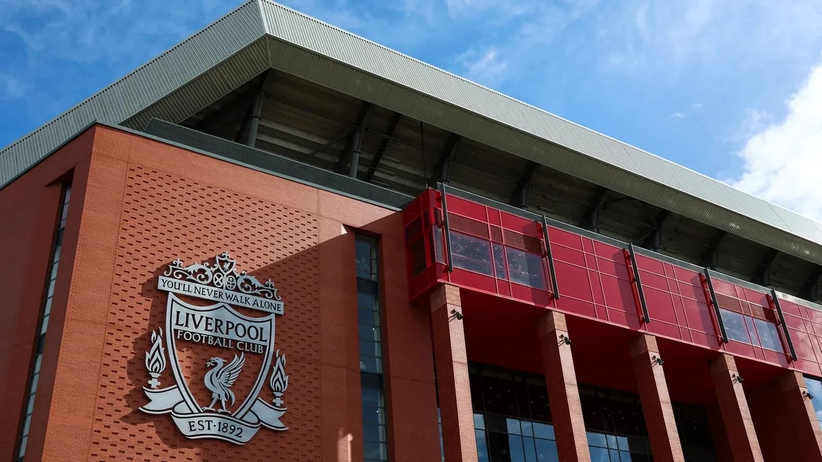 Liverpool Football Club sign on stadium exterior