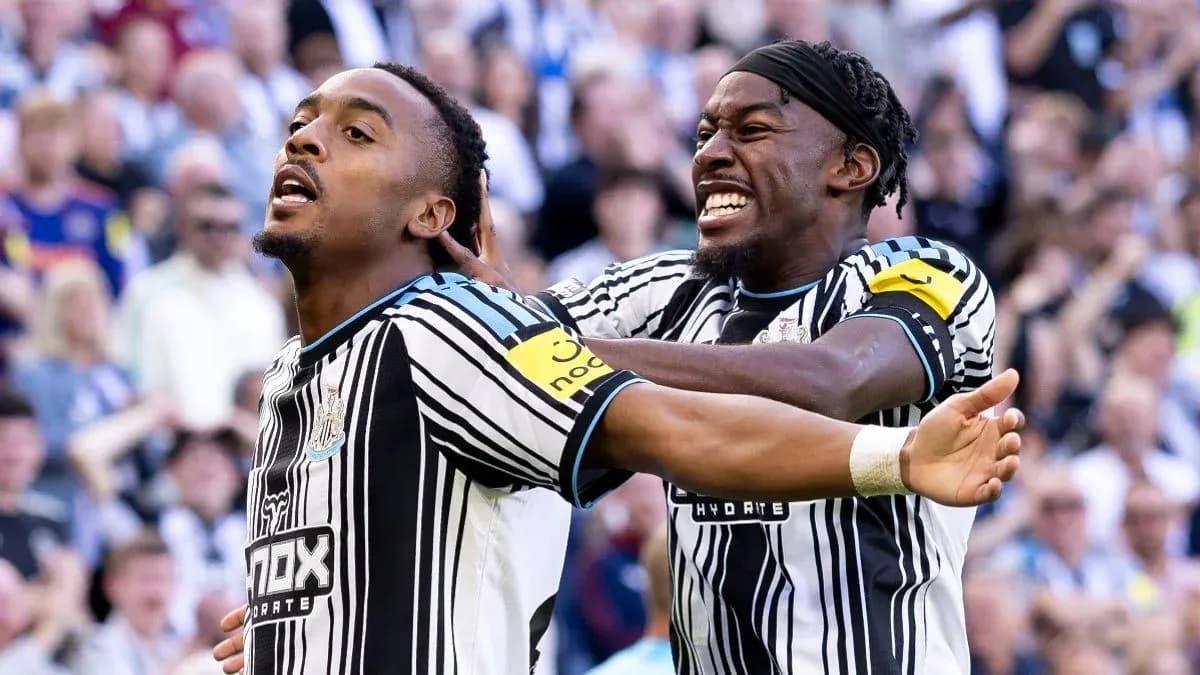 Newcastle players celebrating a goal during match