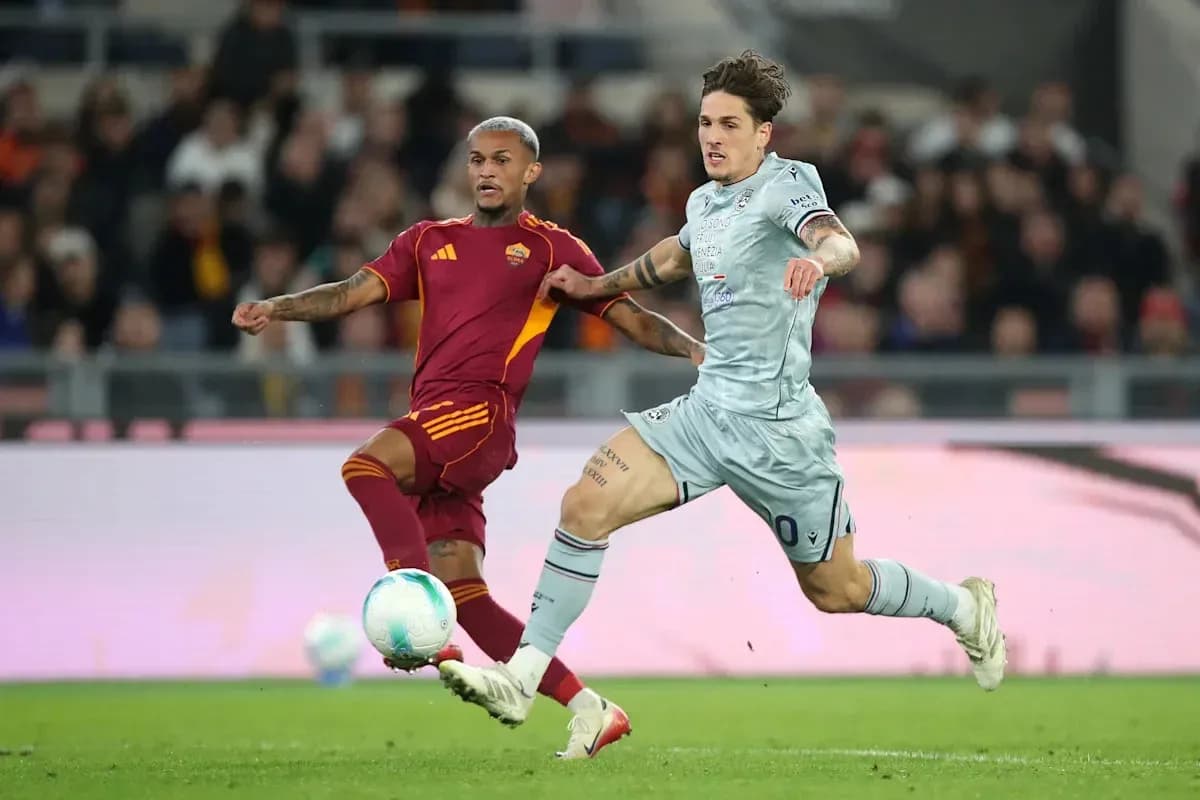 Two players competing for the ball during match