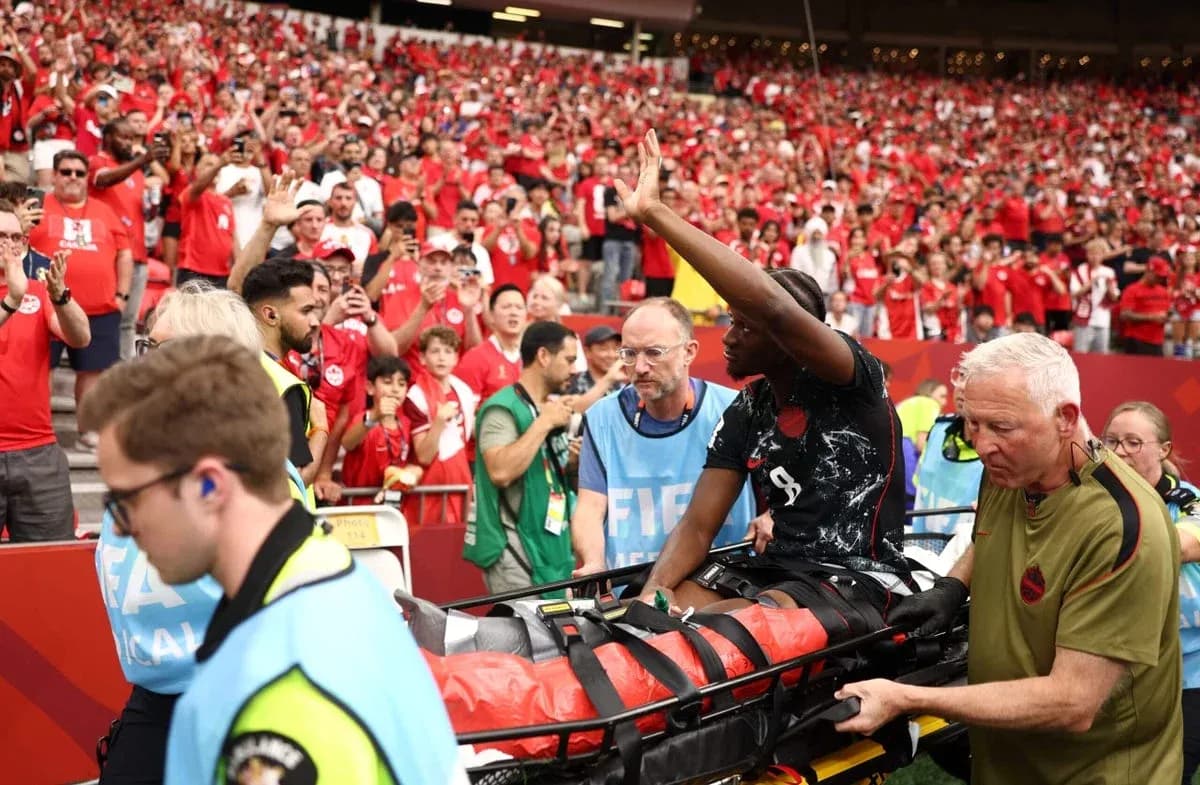 Player being carried off on stretcher during match