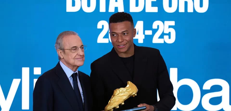 Player receiving Golden Boot award during ceremony