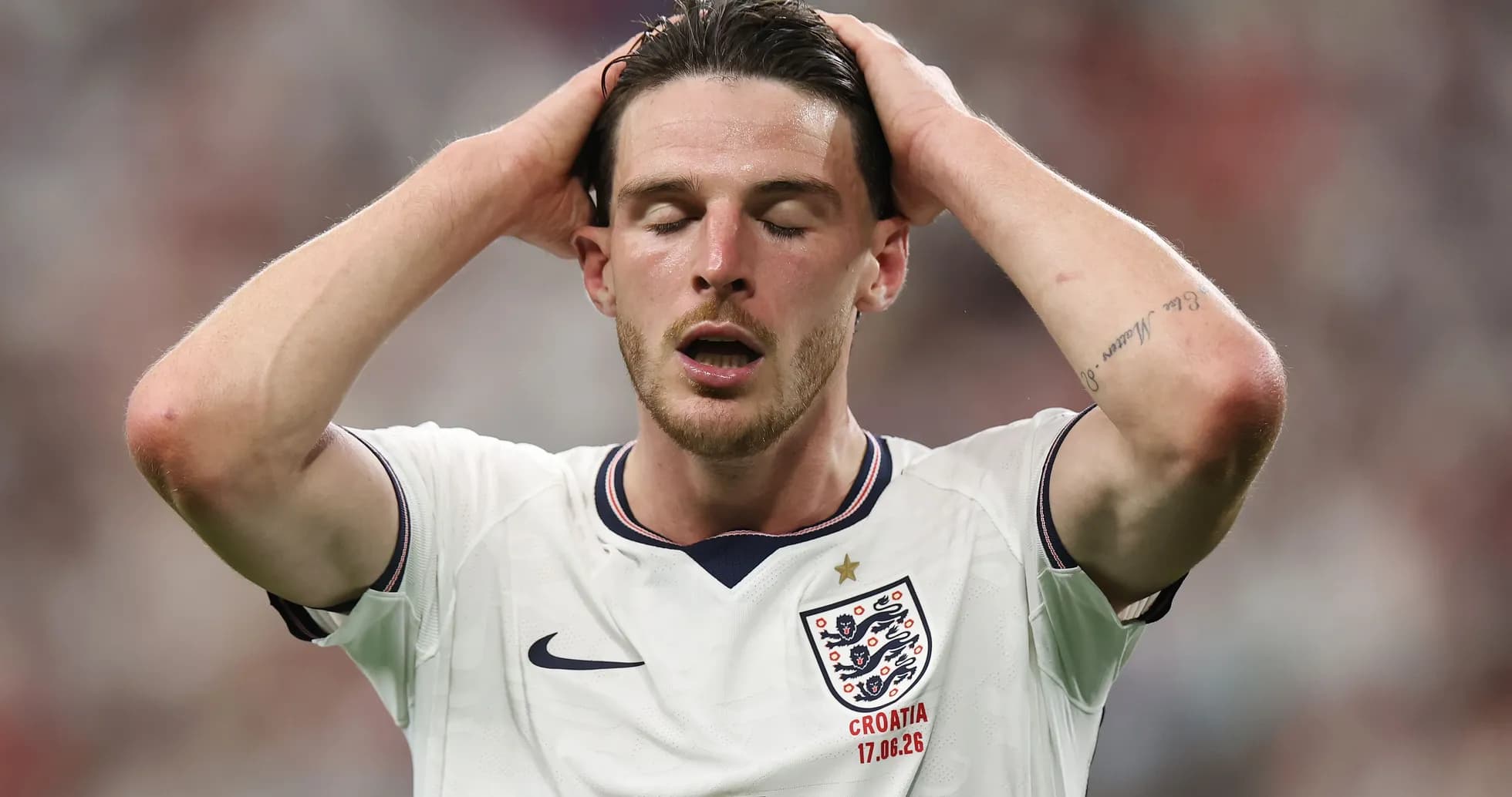 Player with hands on head during match
