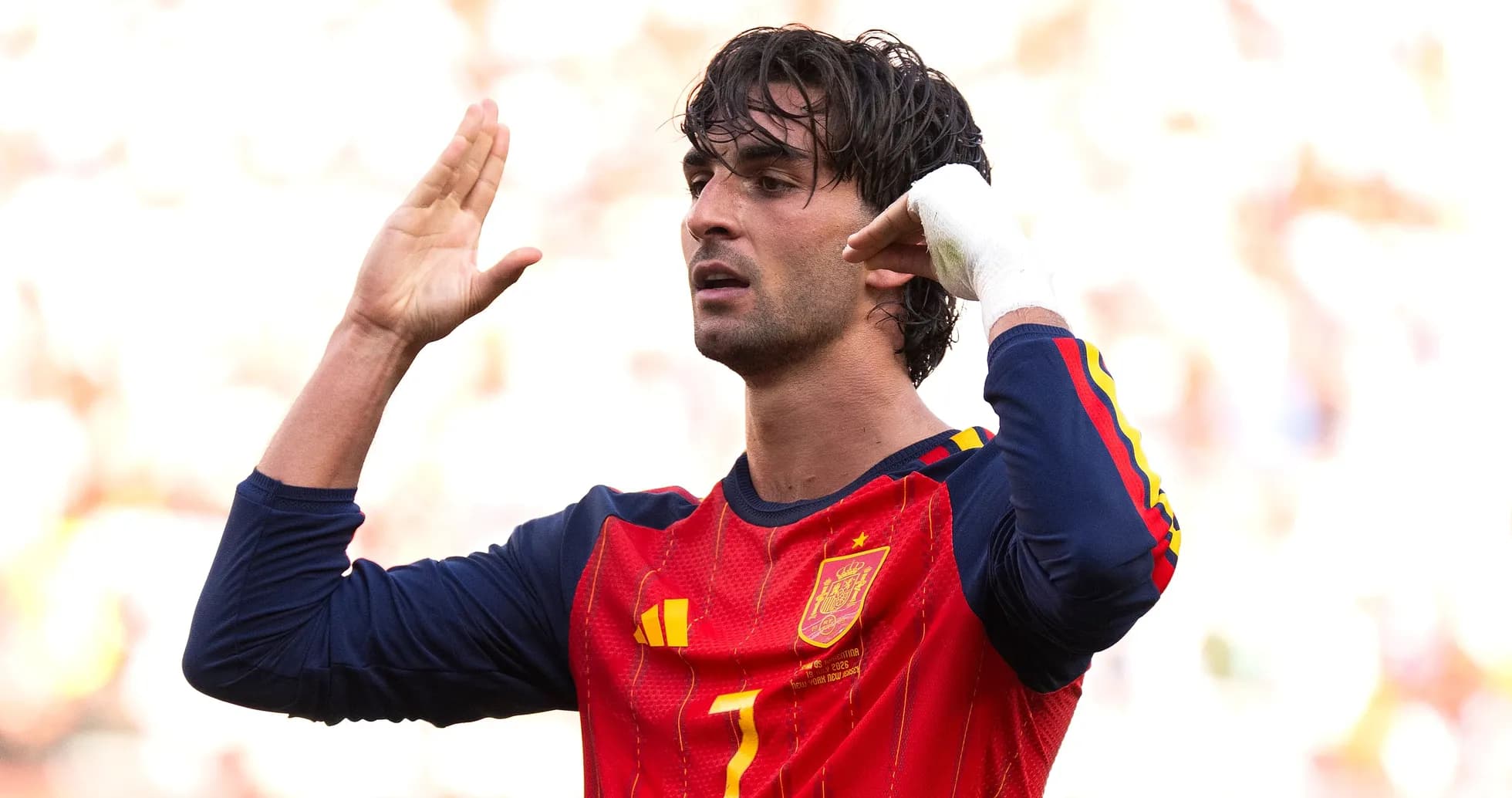 Player gesturing during a football match for Spain