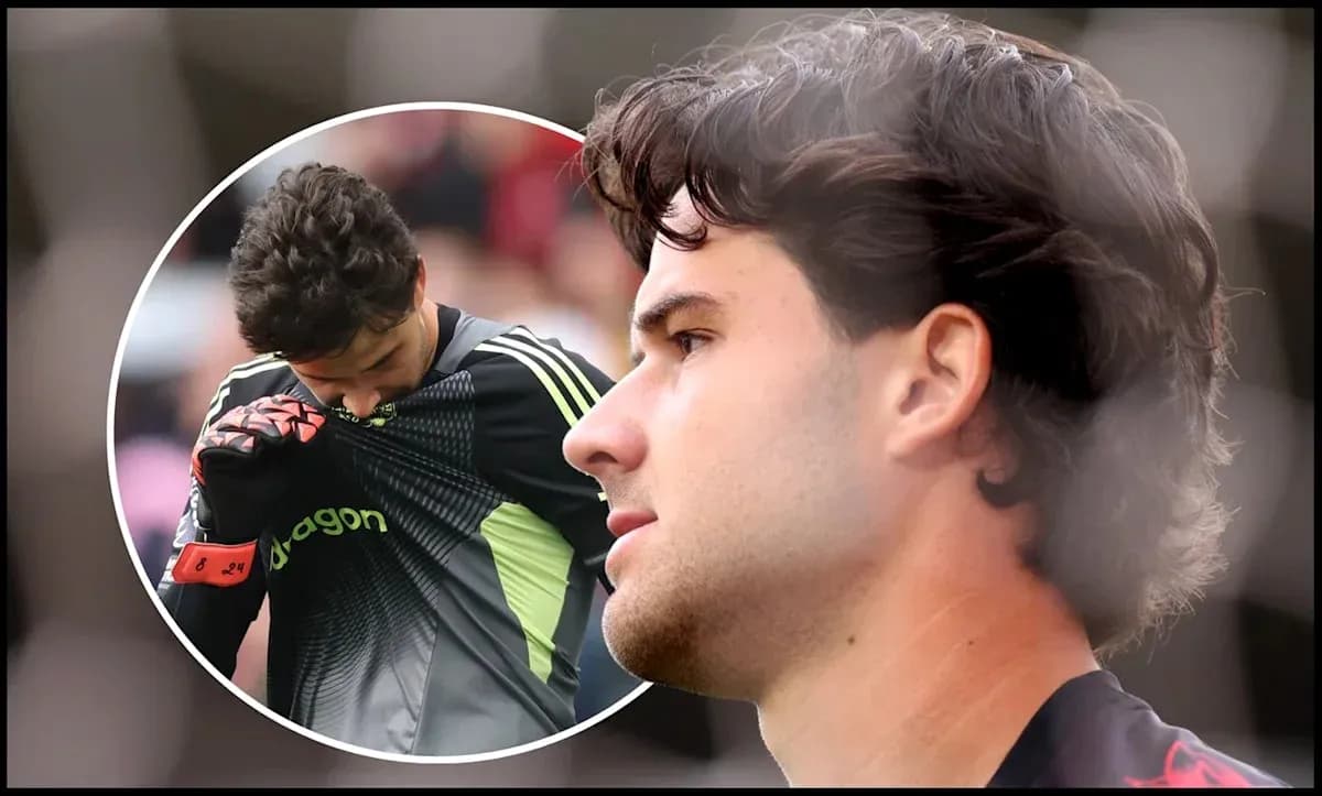 Goalkeeper adjusting jersey during a match