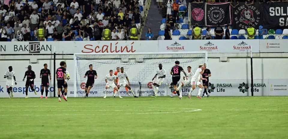 KuPS players defending against Sabah FA attack