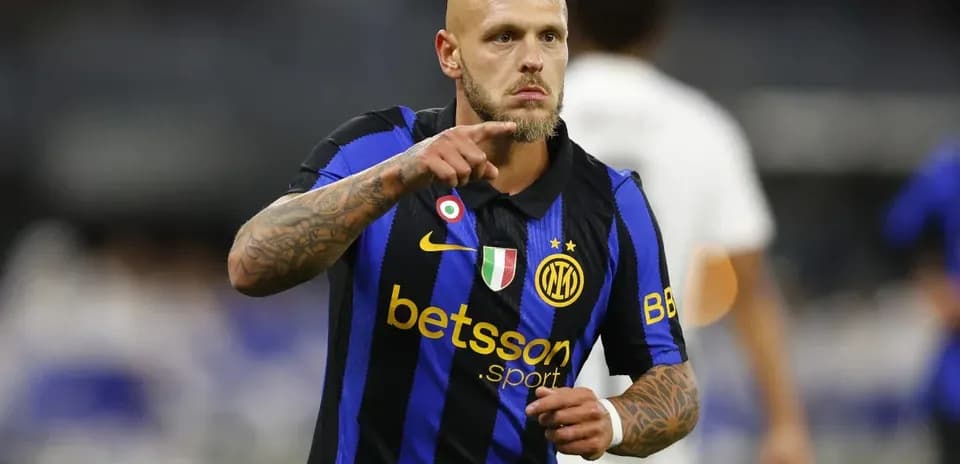 Player celebrating and pointing during a match