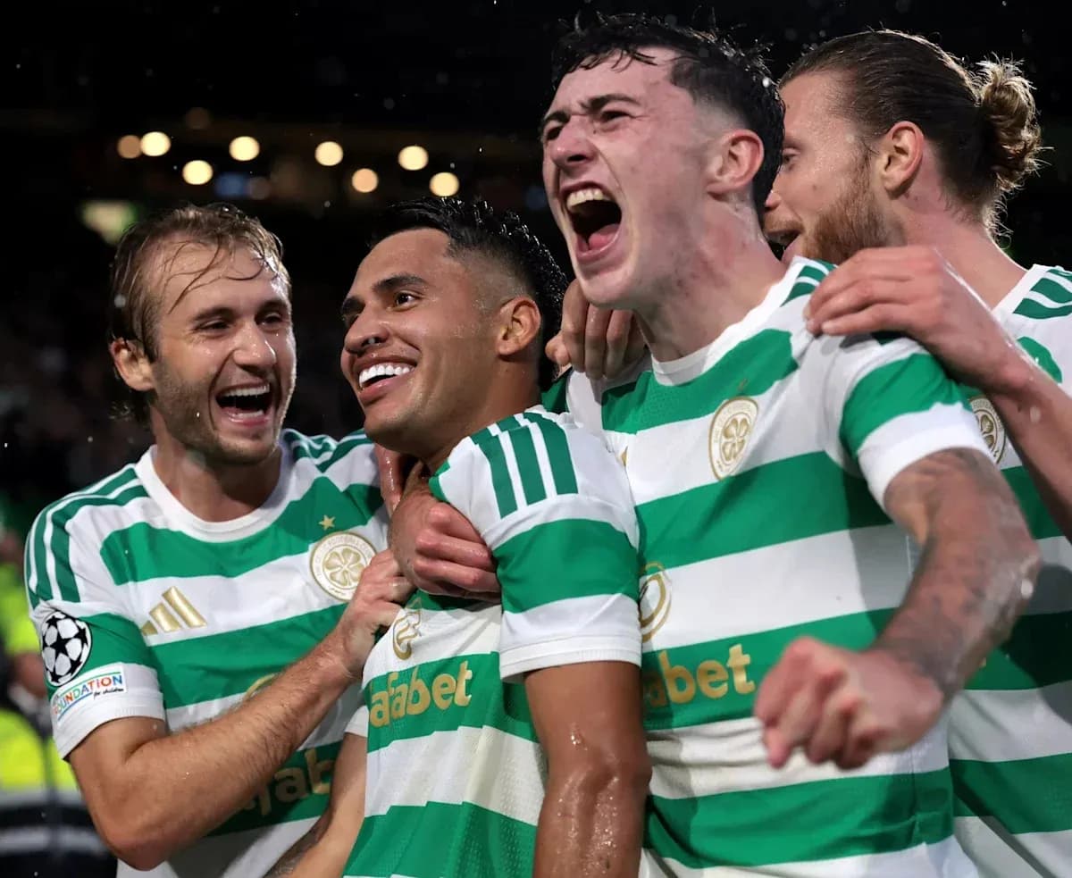 Celtic players celebrating a goal during match