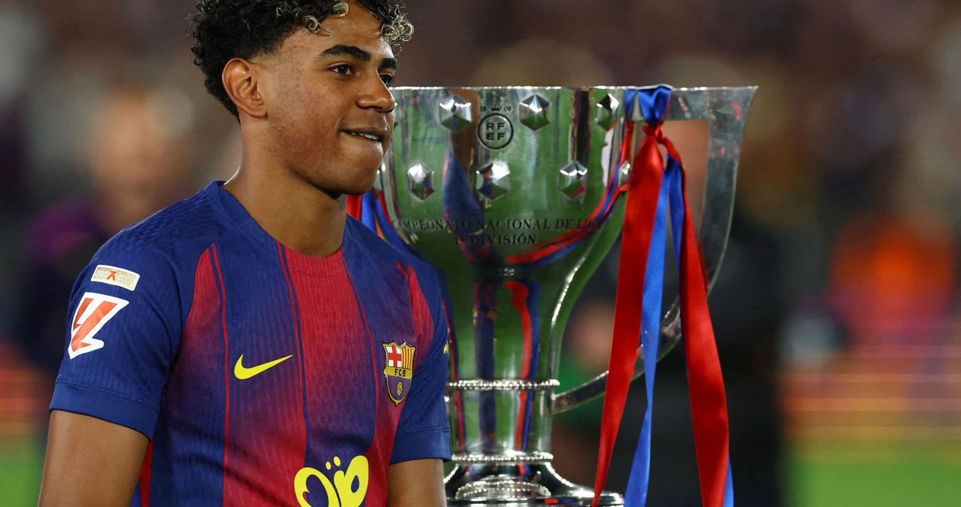 Player celebrating with trophy after winning match