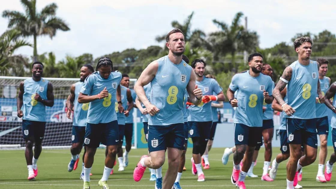 England players jogging during training session