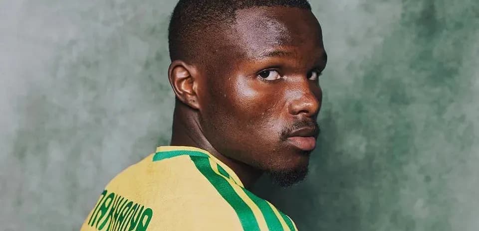 Player posing in national team jersey