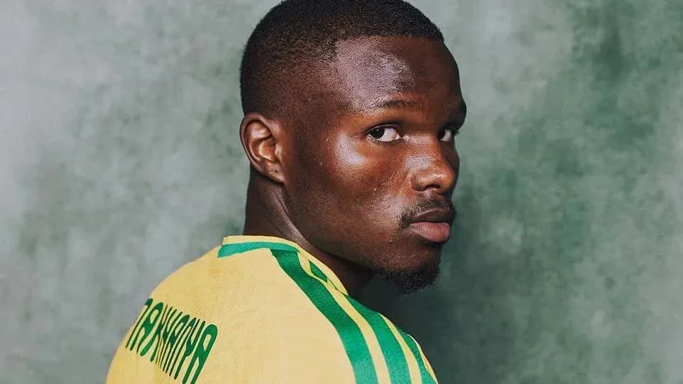 Player posing in national team jersey
