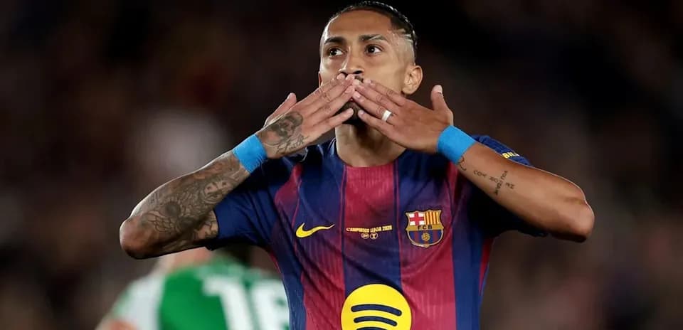 Player celebrating with kiss gesture during match