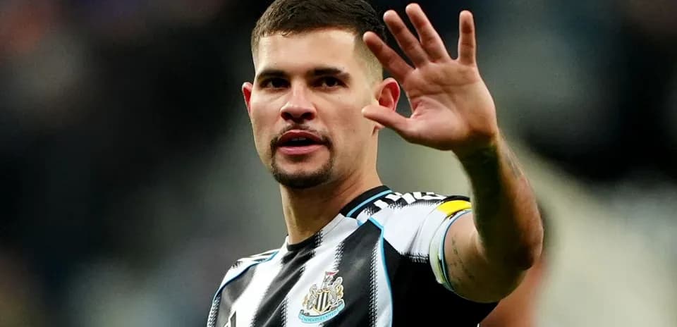Player gesturing during a match for Newcastle United