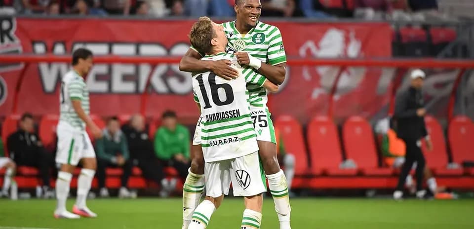 Players celebrating during Ferencvarosi TC match