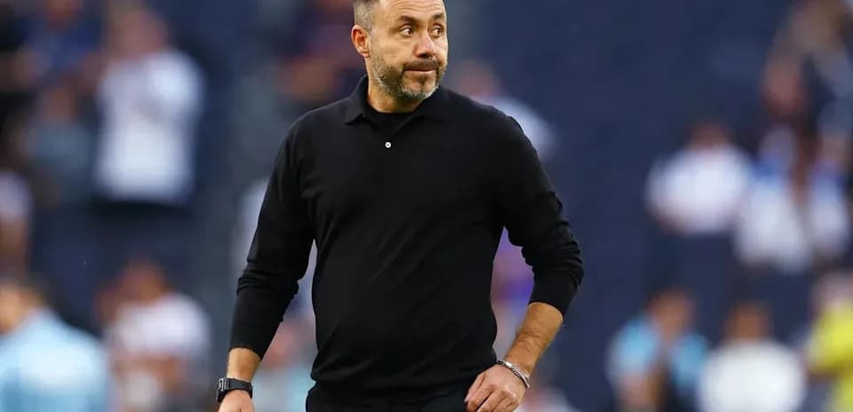 Coach walking on the sideline during match