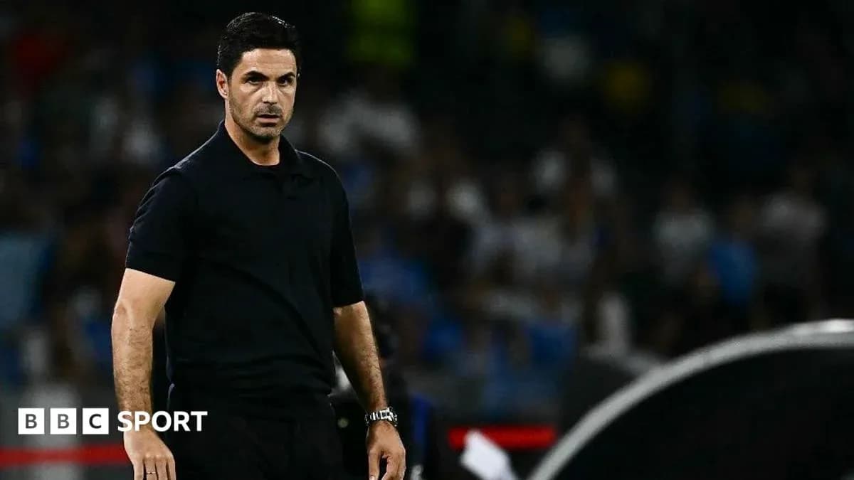 Coach observing the game from the sidelines