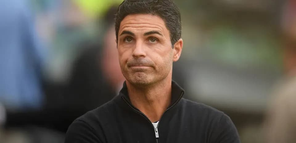 Coach observing the match from the sidelines