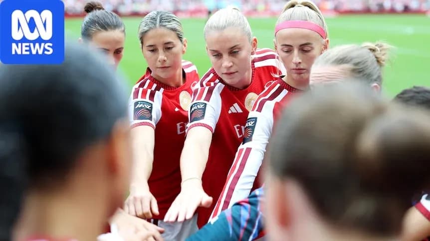 Team huddle before match with players touching hands