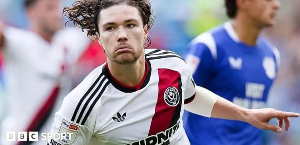 Sheffield United player celebrating during match