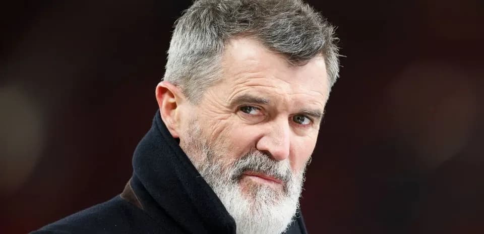 Man with gray beard and intense expression