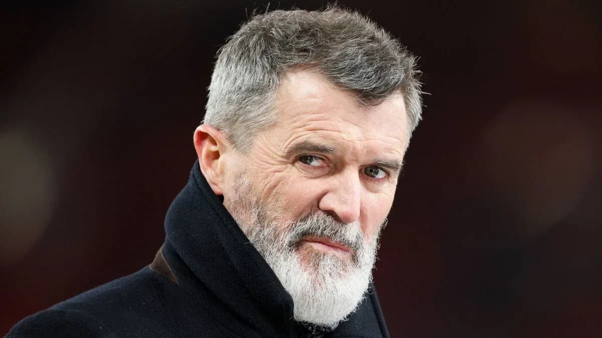 Man with gray beard and intense expression