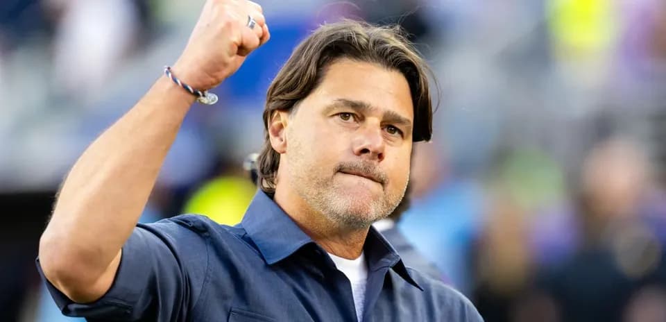 Coach raising fist during a game celebration