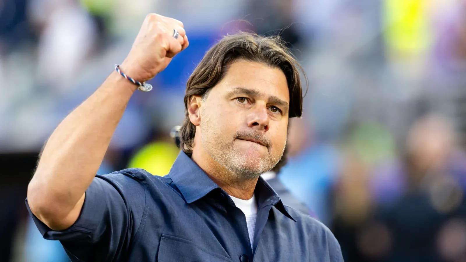 Coach raising fist during a game celebration
