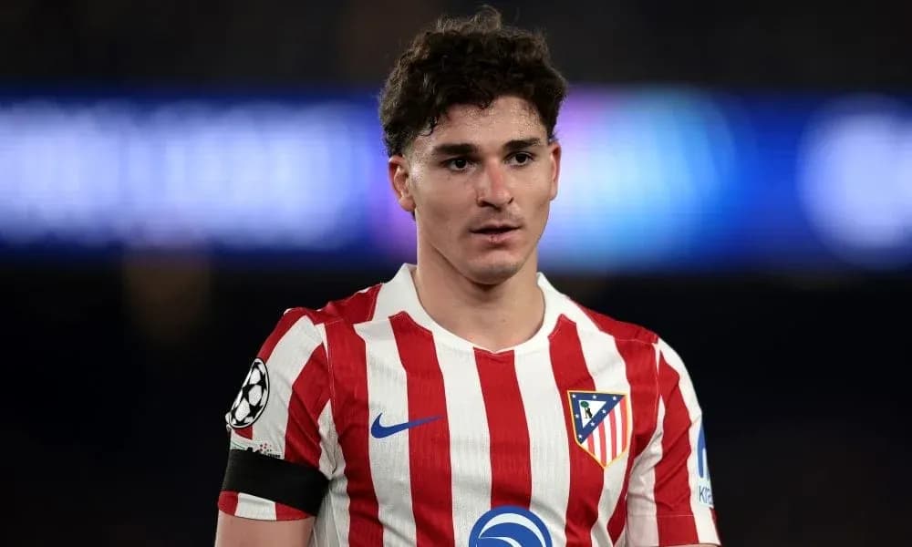 Atletico Madrid player in red and white jersey
