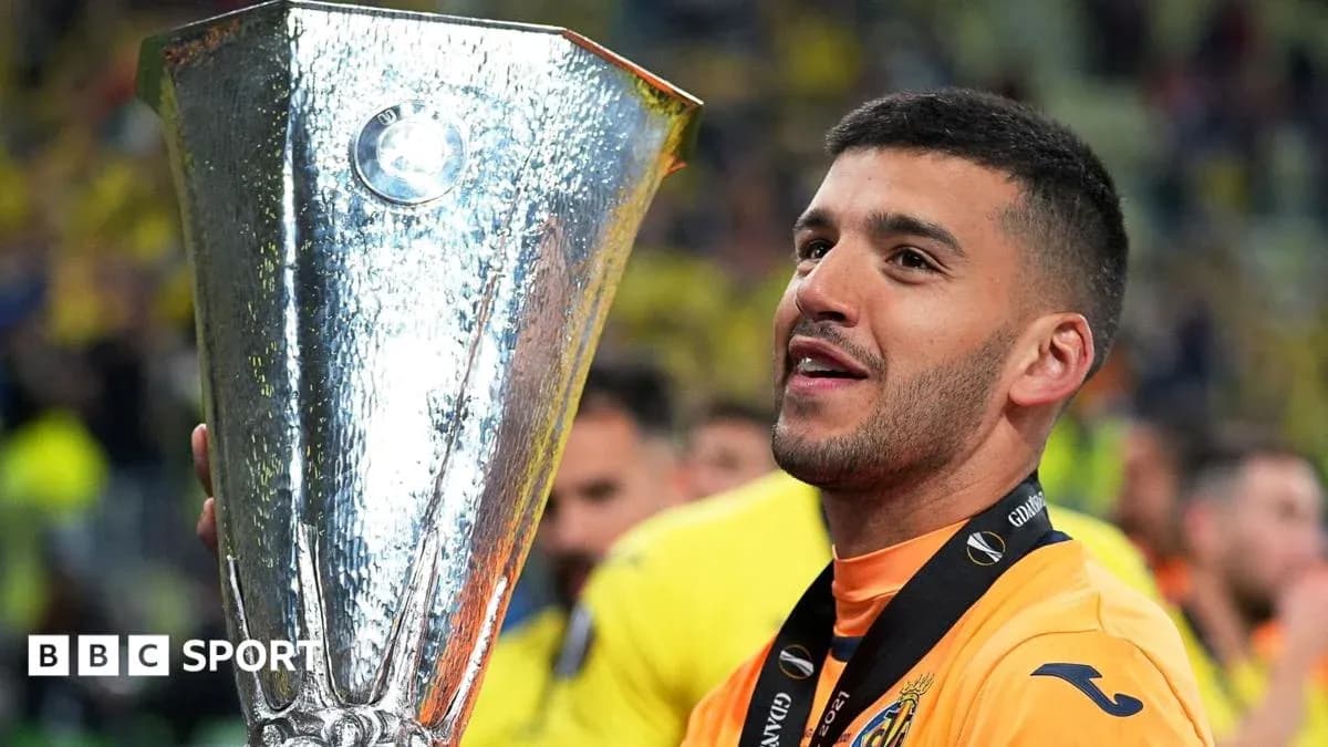 Player holding UEFA Europa League trophy after victory