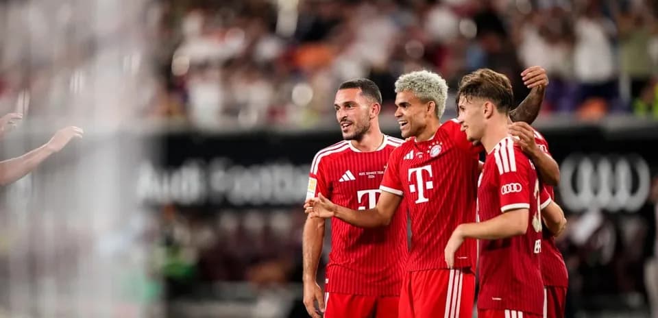 Bayern Munich players celebrating a goal together