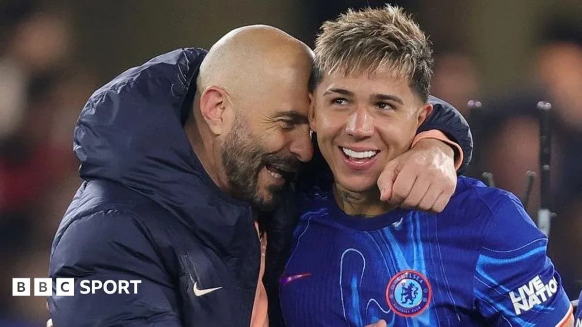 Coach and player celebrating together after match