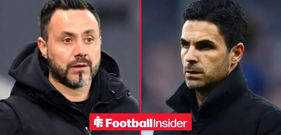 Two football managers looking serious during match