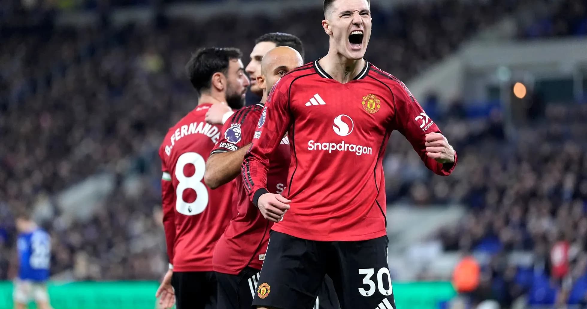 Manchester United players celebrating a goal