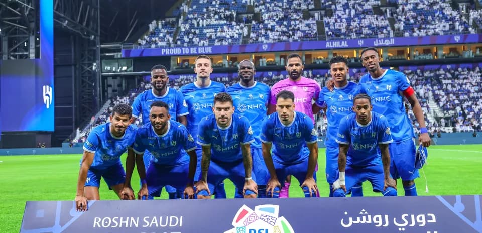 Al Hilal team posing for a group photo before match