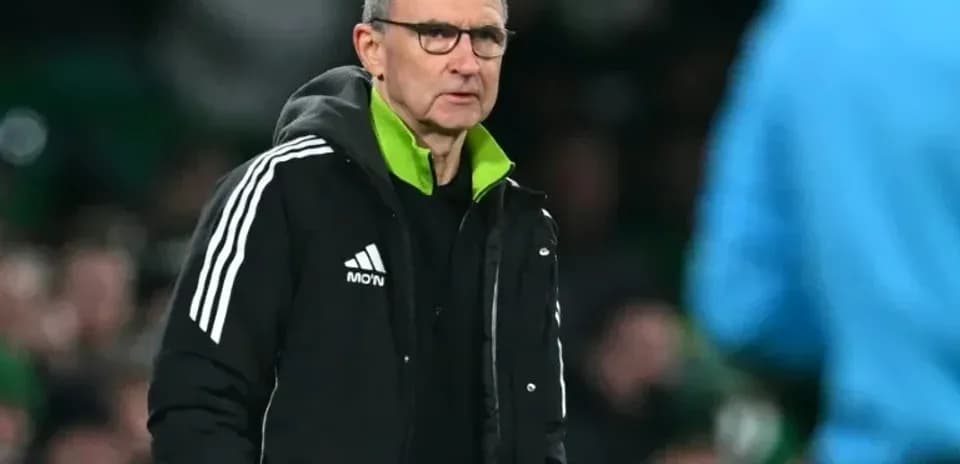 Manager observing the game from the sidelines